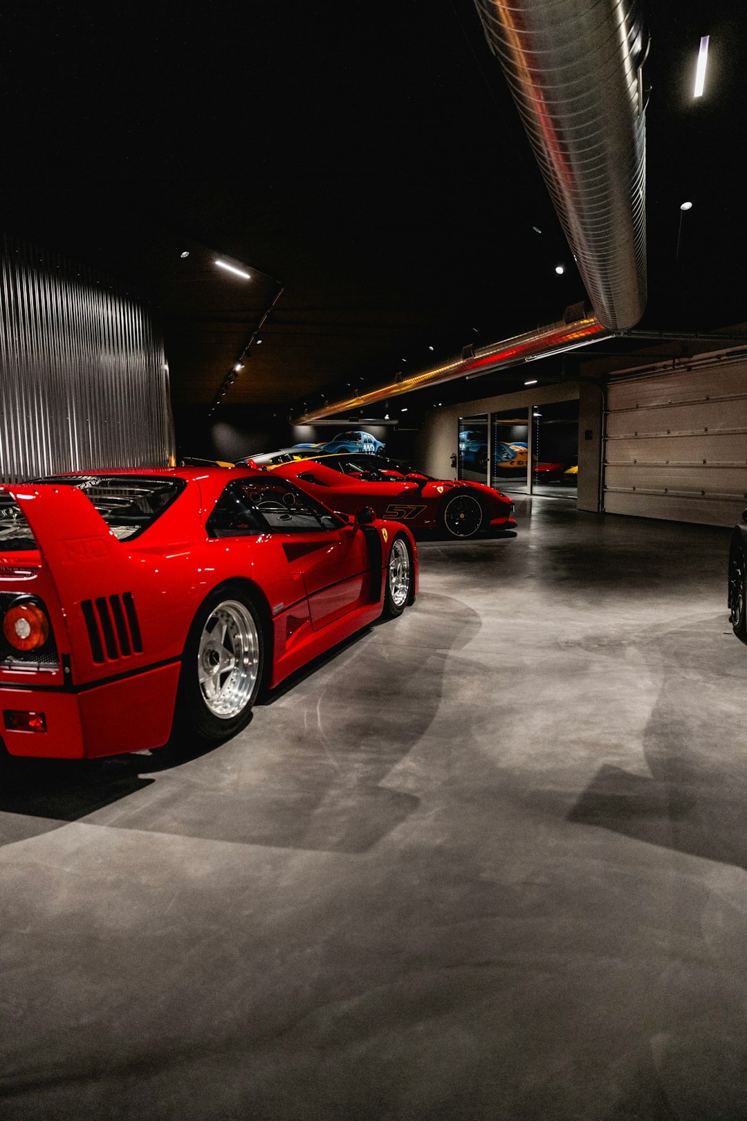luxury car collection in garage