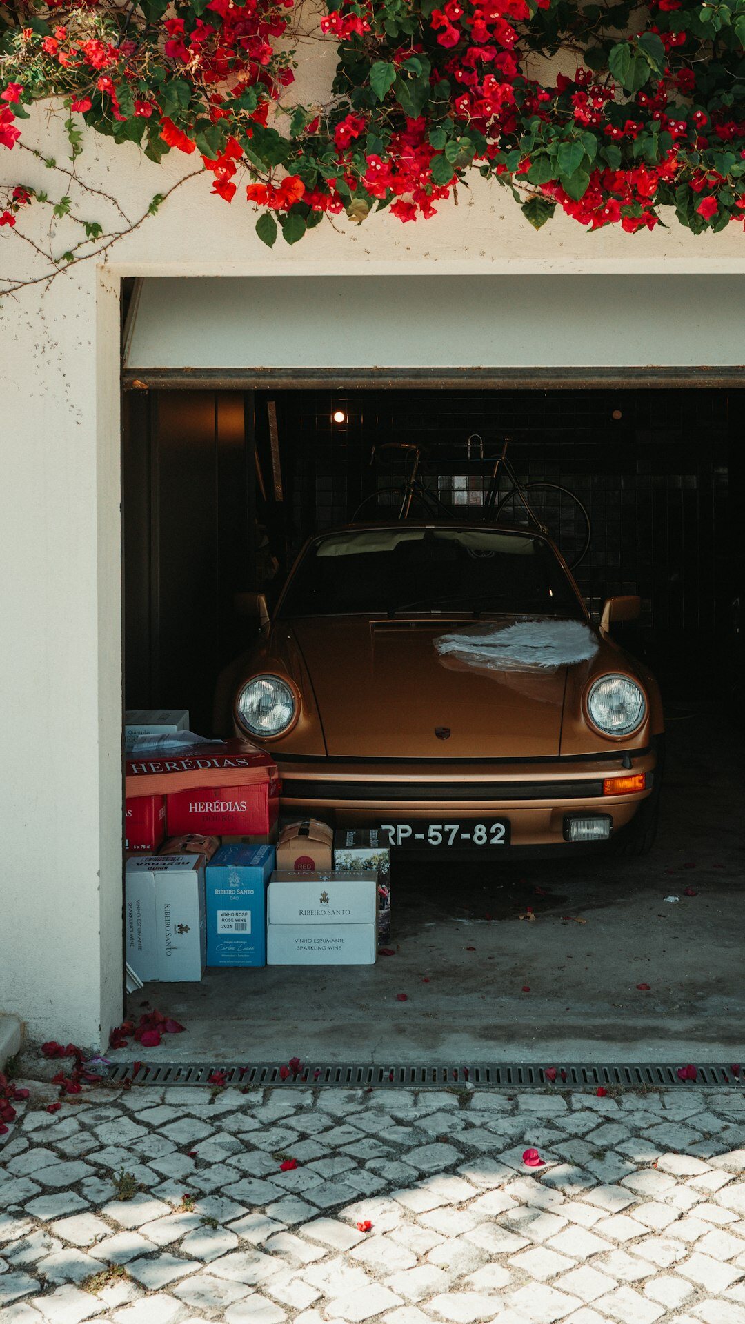 Row of classic automobiles inside a private collector garage