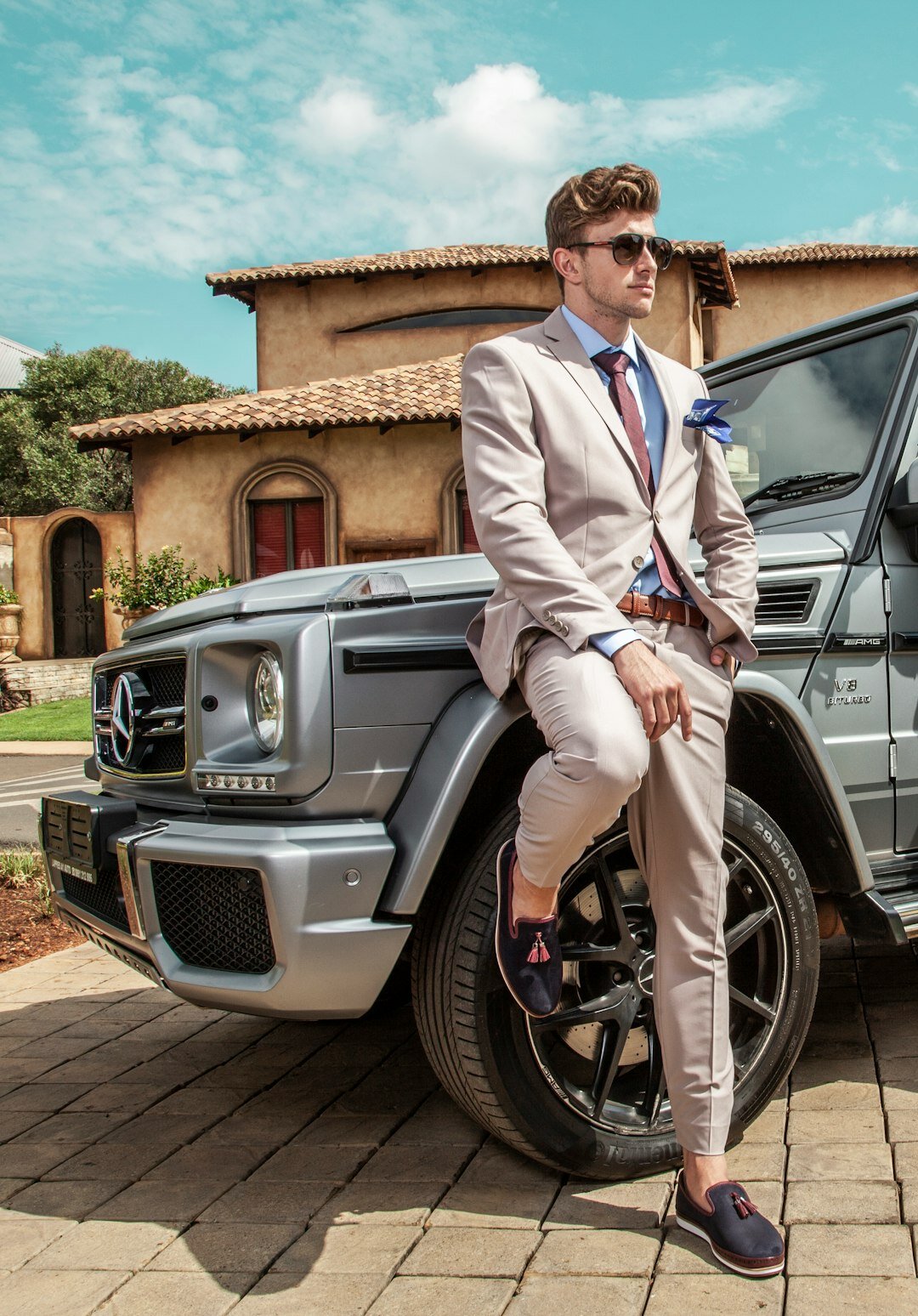 business person with luxury car